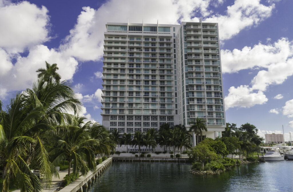 Upscale riverfront living is redefined through contemporary architecture, seamless interior layouts, and floor-to-ceiling expanses that frame sweeping views of the Miami River. Set along 450 feet of the Miami Riverwalk, Pier 19 Luxury Allapattah Apartments offers thoughtfully curated interiors where design, function, and finish work come together effortlessly. Indoor amenities include an attended lobby, a multifunctional River Lounge and library that doubles as a co-working space, a modern fitness center, and a private theater suite—each enhanced by refined millwork and elevated interior detailing by Salini Design and Build